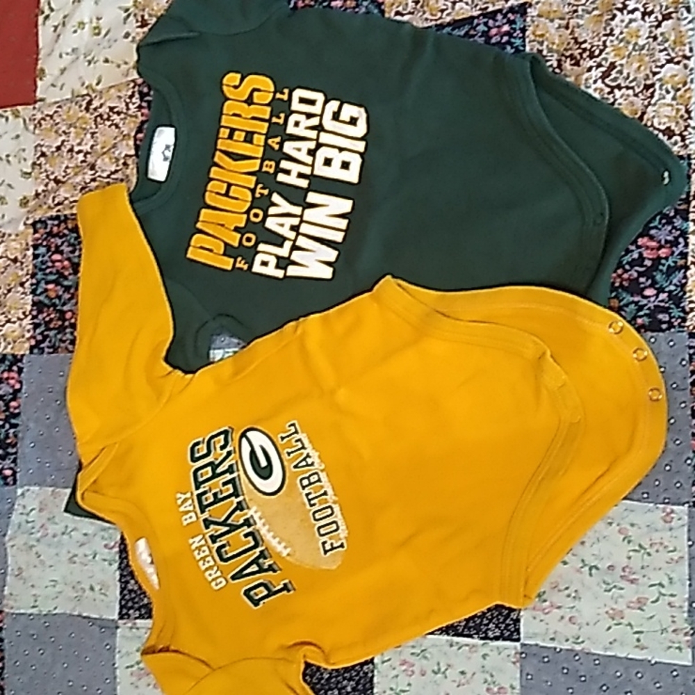 NFL Team Apparel 3-6 months Green Bay Packer onsies.  Sold as a set.